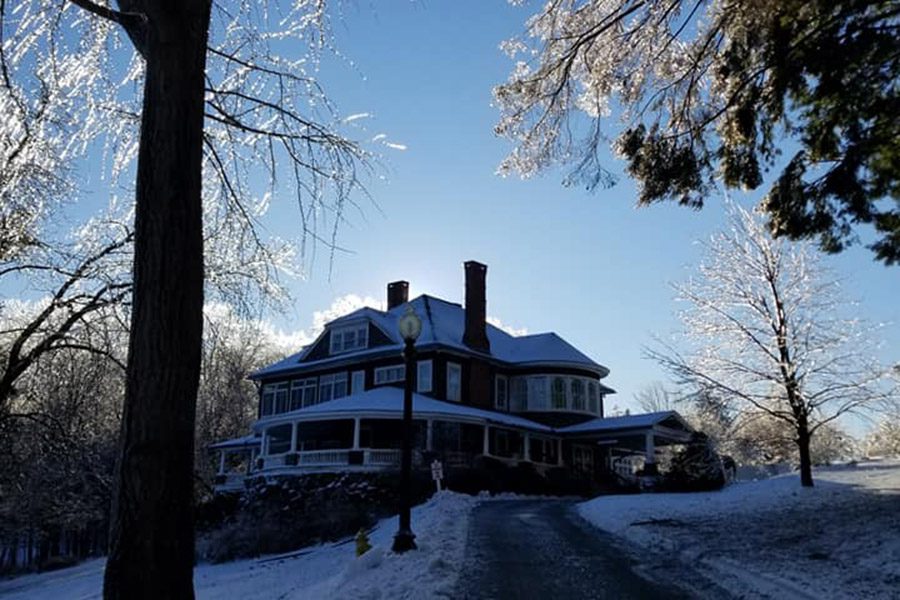 Tarrywile Mansion view-of-mansion-from-dirveway-covered-in-ice-and-snow